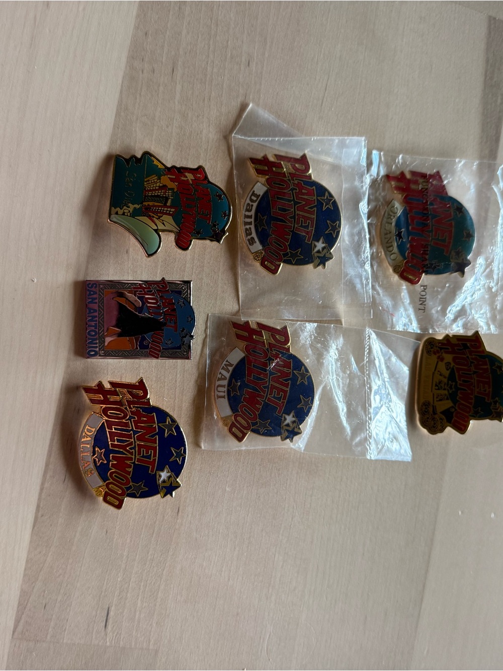 Planet Hollywood Collectible Pin Set - Blue, Red, Gold